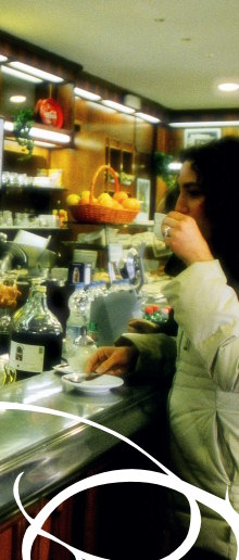 A woman in a coffee house, Rome/Andrew Ostor
